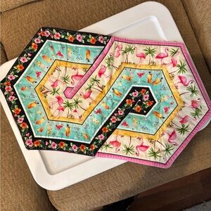 Table topper with Caribbean colors. 24” x 14”. New. Hand made. Cotton fabric.